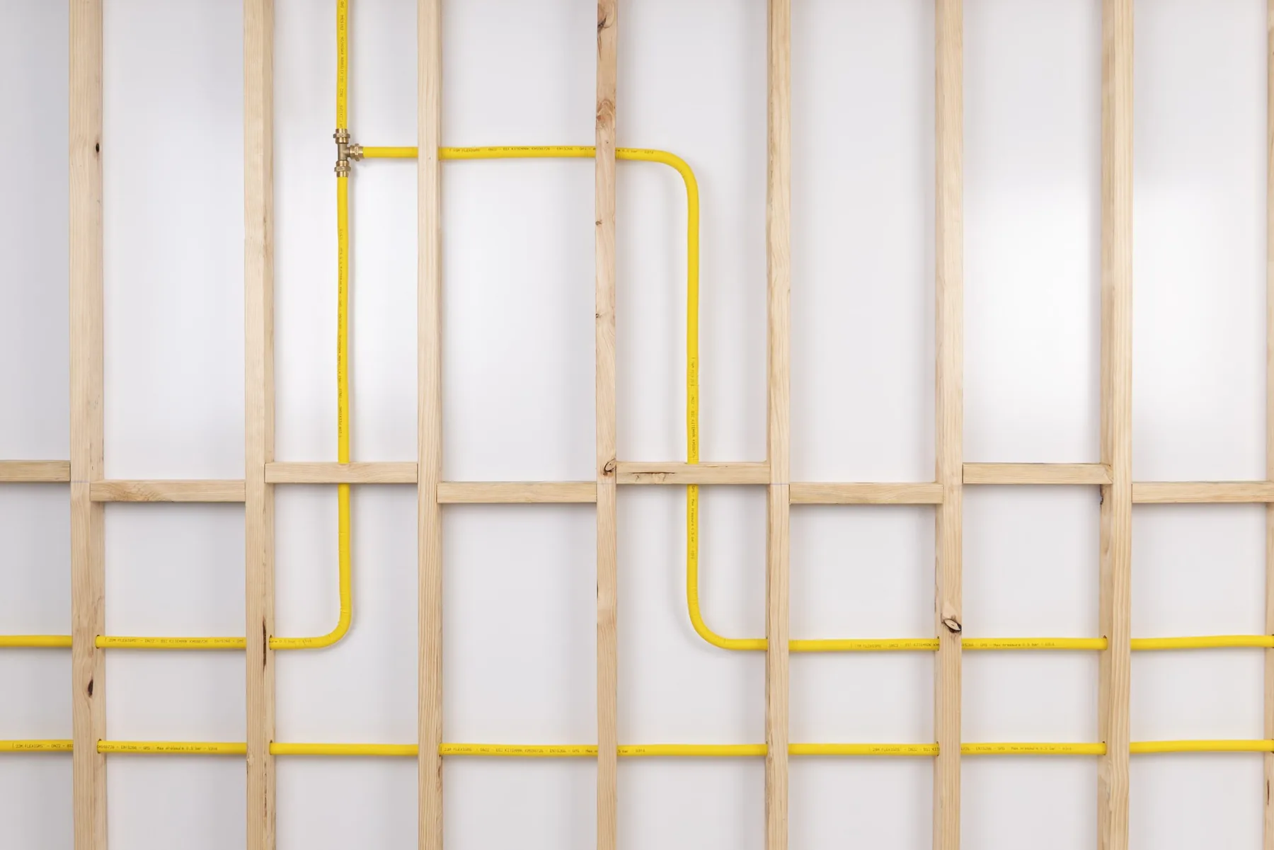 Flexigas yellow gas pipe runs on a real installation